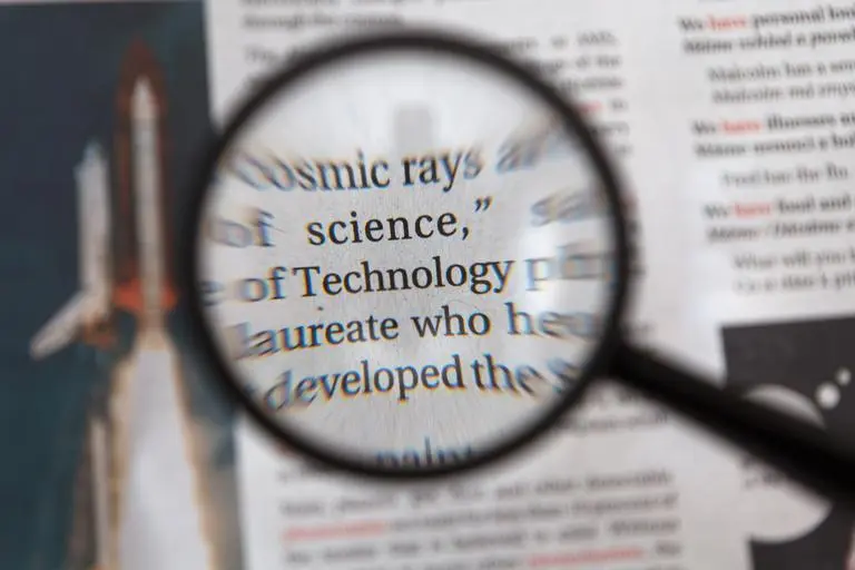 Magnifying glass on a text